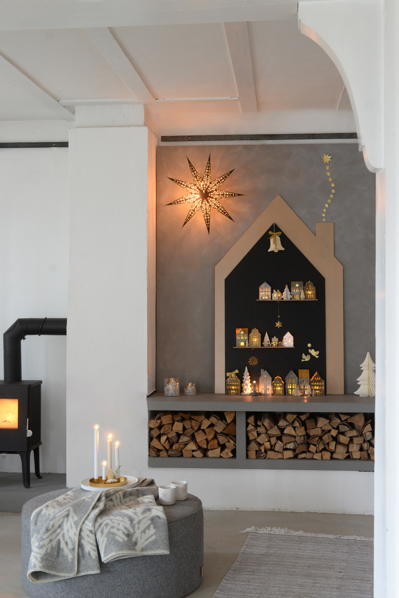 Weihnachtsdeko-goldene-leuchtende-lichthaeuser-weihnachtsstadt wunderschoen-gemacht